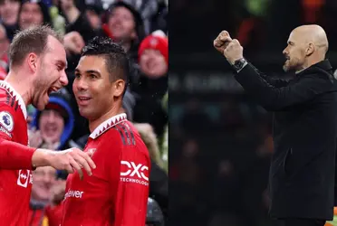 The Danish midfielder watches from the sideline as a rival player gets Erik Ten Hag's approval.